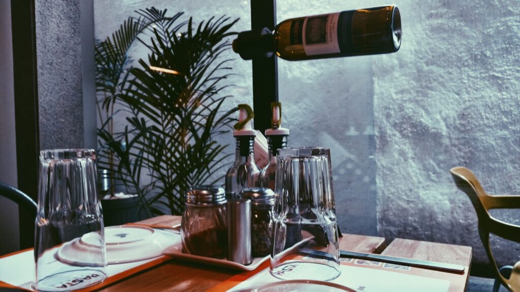 Clear drinking glass on table