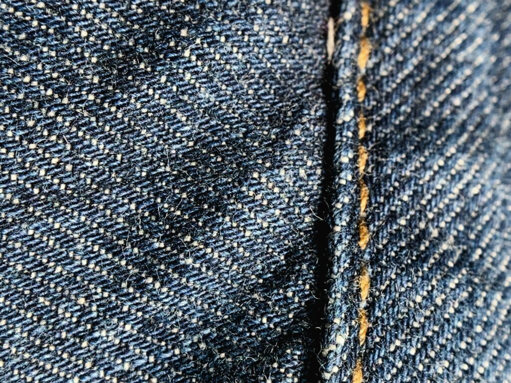 A close up of a blue and white checkered jacket