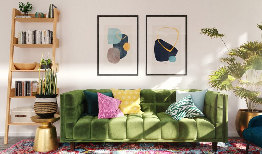 Green and white throw pillows on green sofa