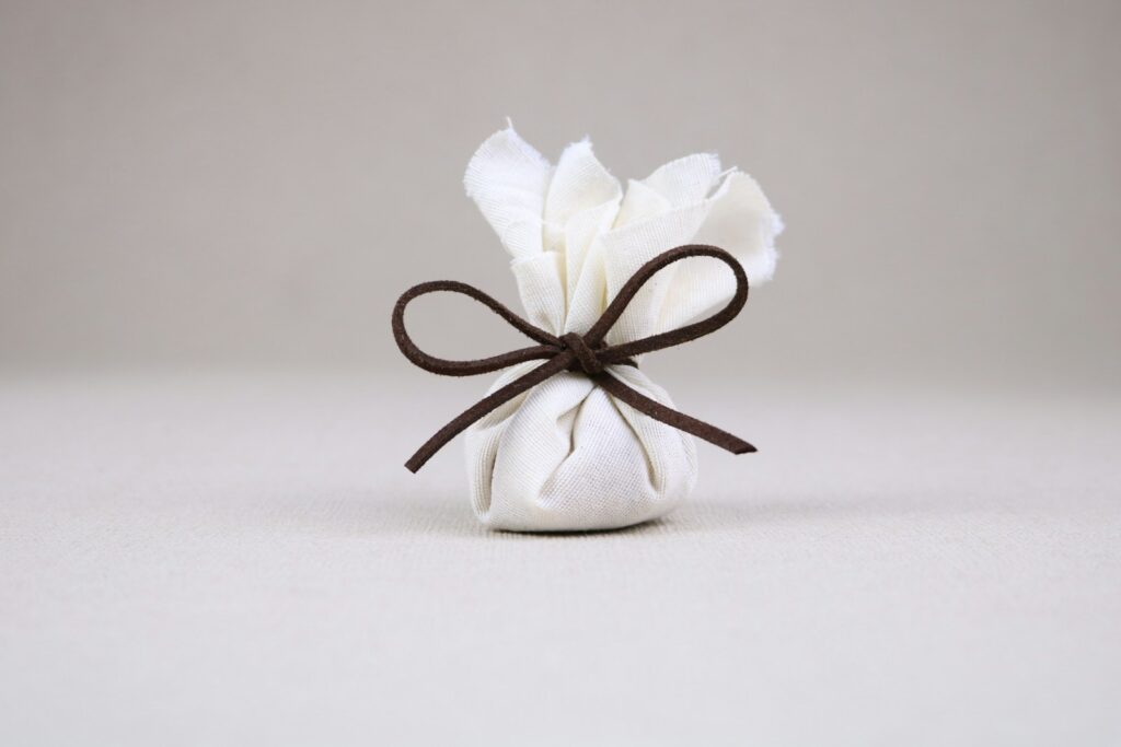 White and black ribbon on white textile