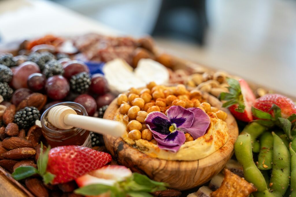 A delicious charcuterie board with various snacks.
