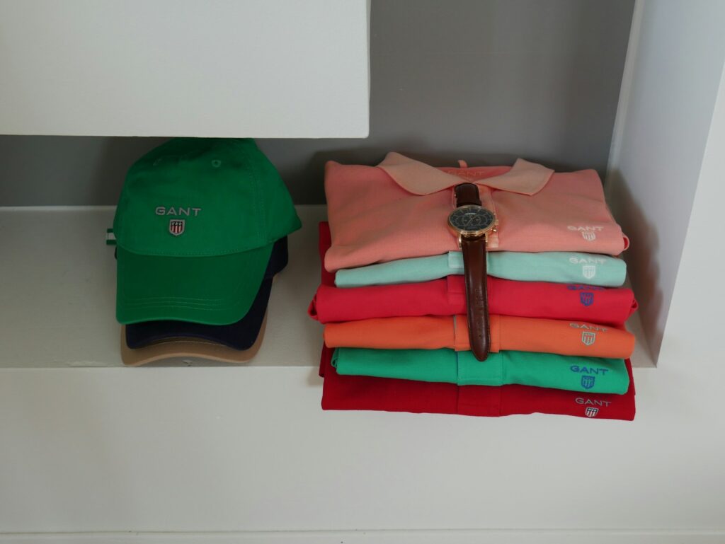 Green and orange cap on white table