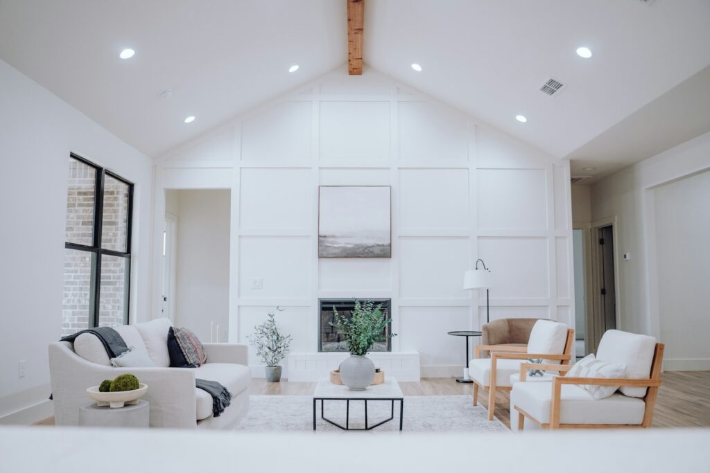 A living room filled with furniture and a fire place