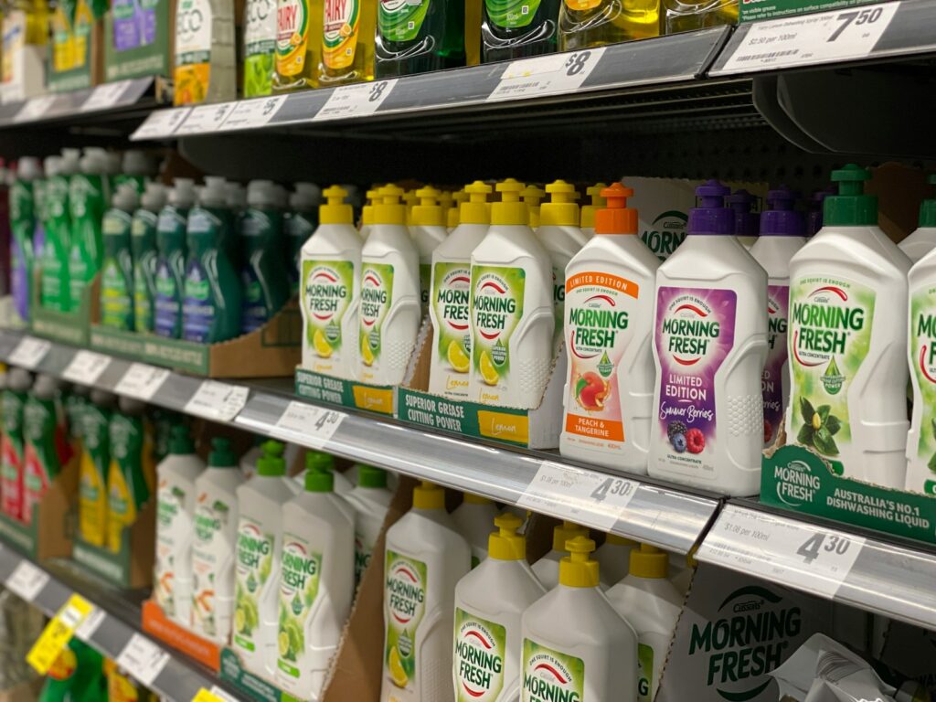A display in a store filled with lots of bottles of cleaning products.