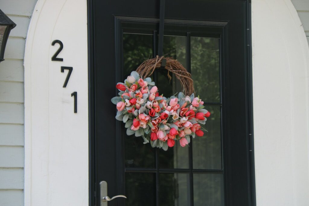 Pink and white flowers on window