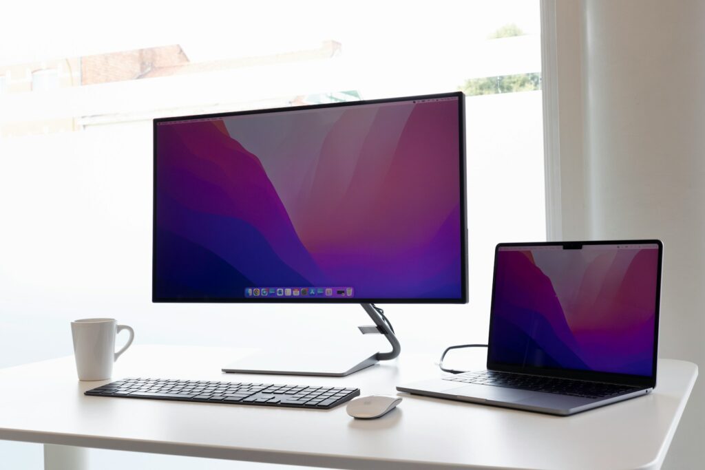 A laptop and a desktop computer