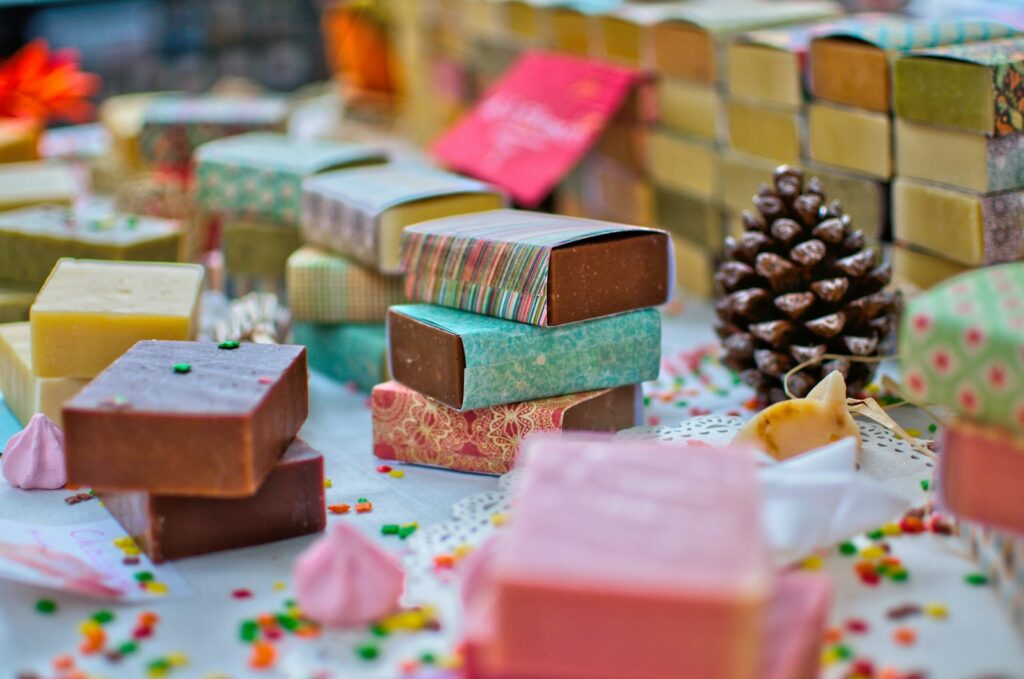 Assorted-color bar soap lot on white surface