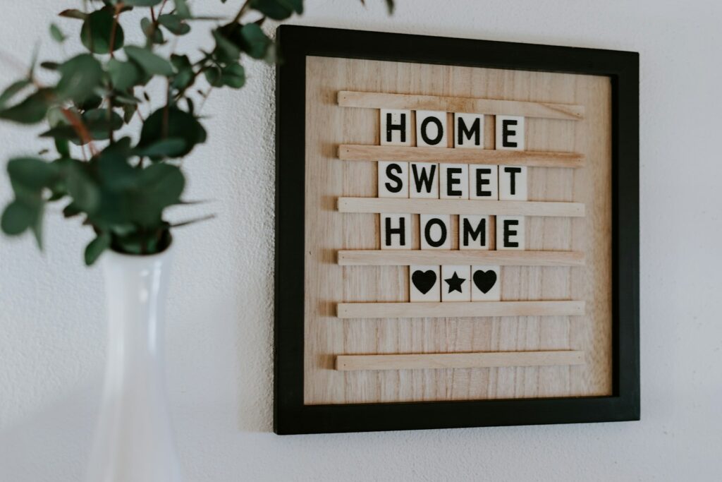 Brown home sweet home wall frame.