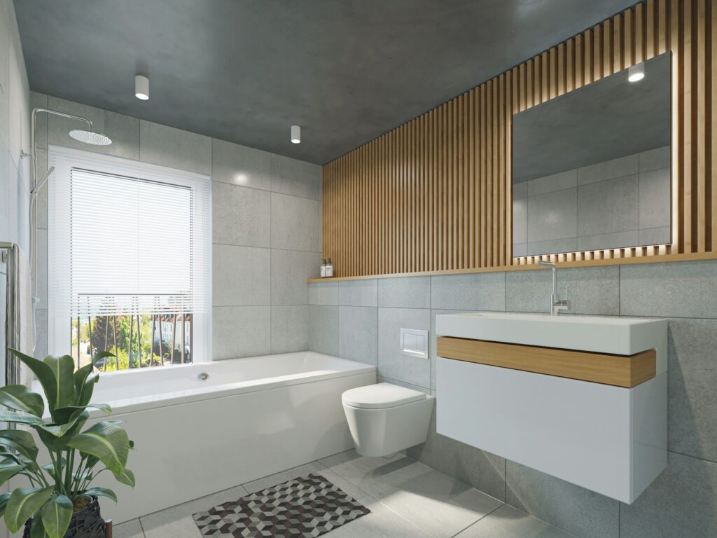 A bathroom with a toilet, sink, and bathtub
