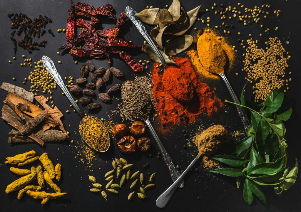 A table topped with different types of spices.
