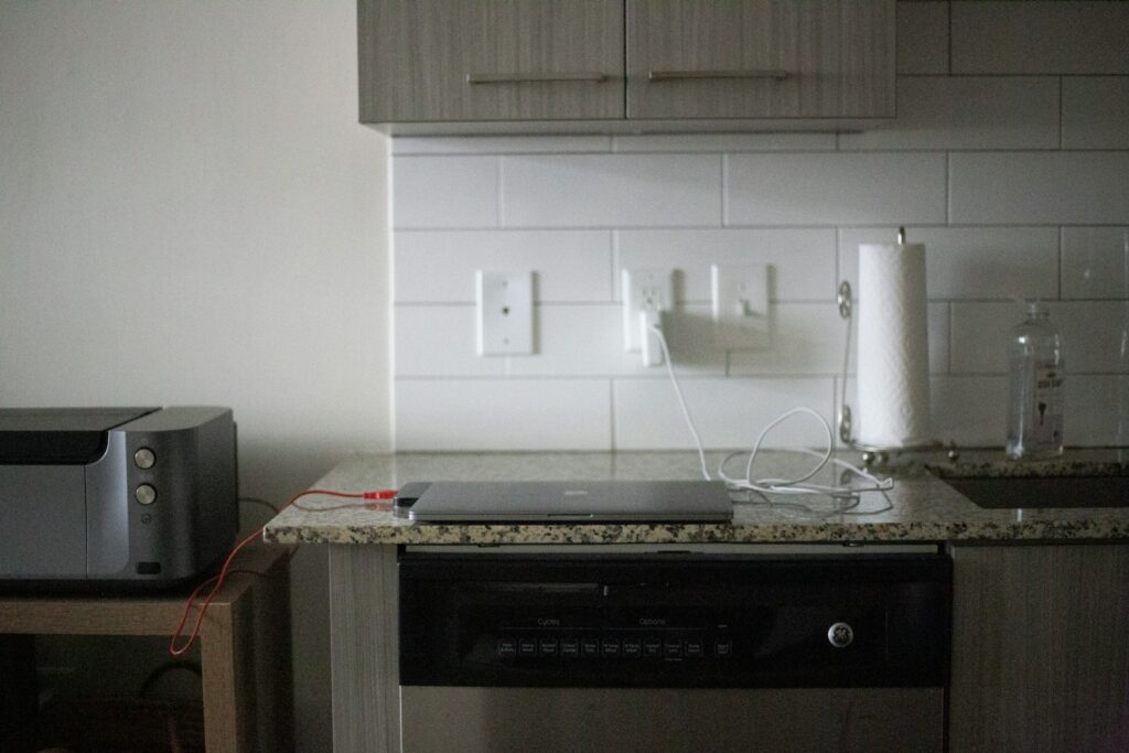 A stove top oven sitting inside of a kitchen