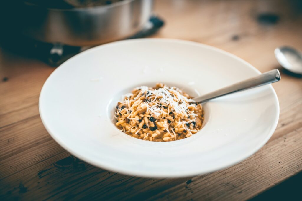 A bowl of food on a wooden table