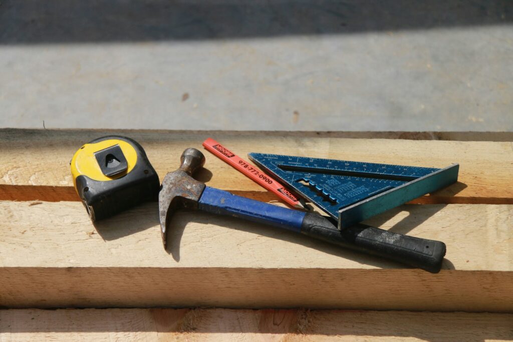 Black and yellow claw hammer