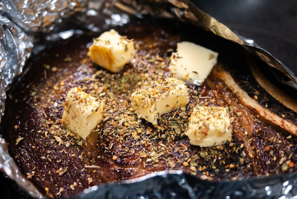 A close up of a piece of food in a foil bag